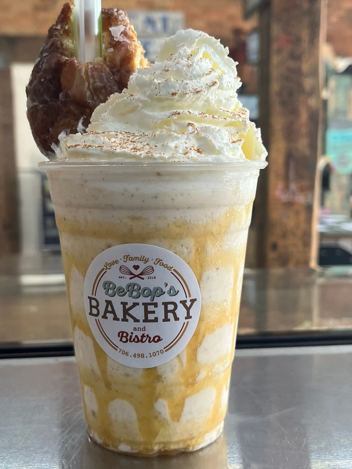 BeBop's frozen coffee — whipped cream, cinnamon & an apple fritter